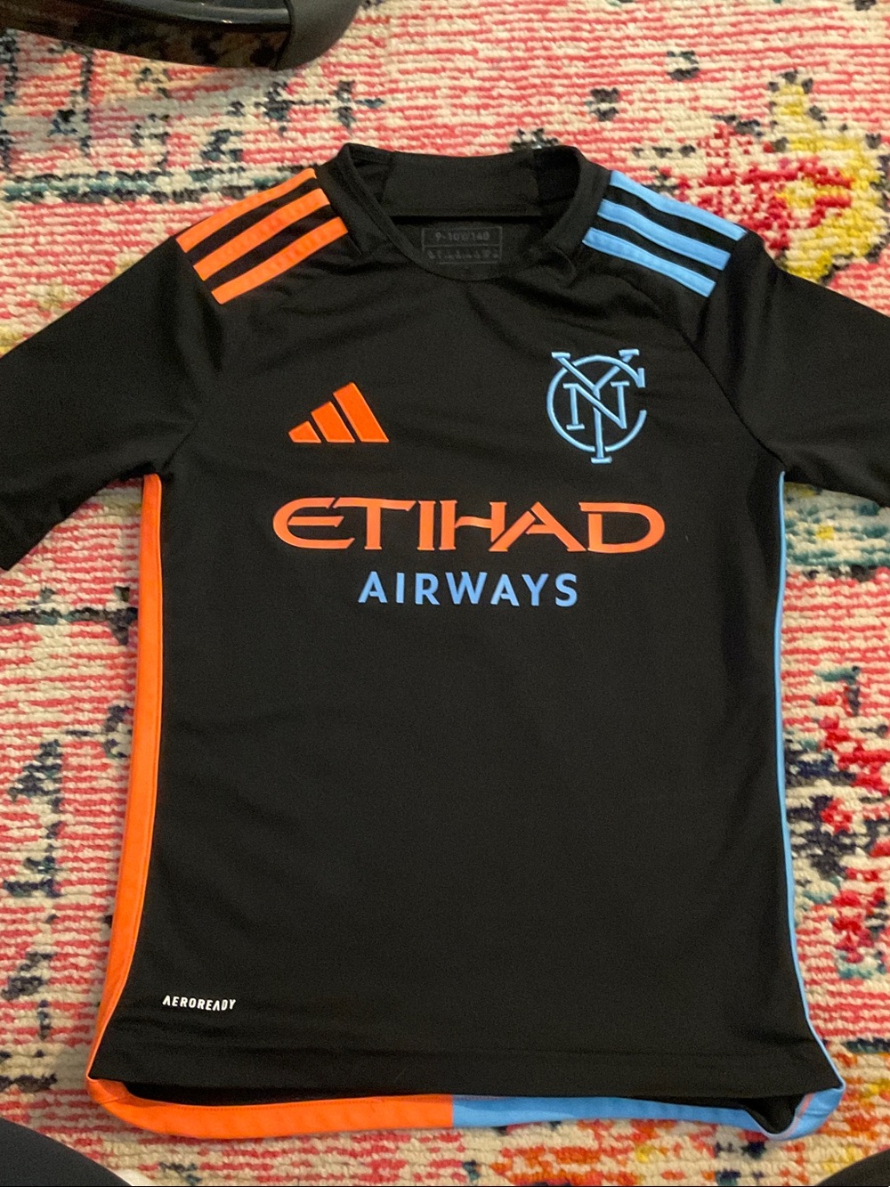NYCFC Black Jersey with Orange & Sky Blue Accents